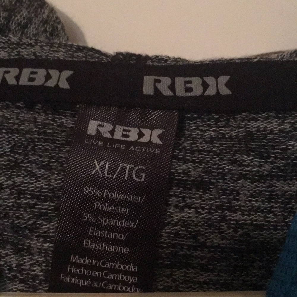 A gray pullover. - Picture 2 of 3